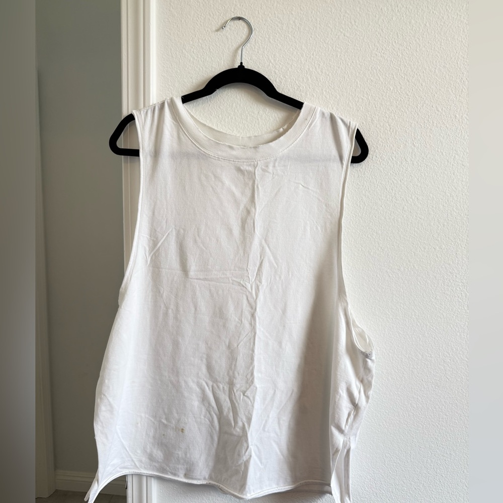 NWOT-flawed free people hot shot relaxed top only  size: L